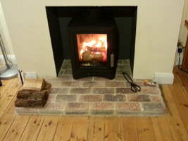 Broseley eVolution 5 on brick hearth with bullnose corrners