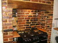 cooker recessed into chimney breast