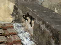 damp penetrating from roof boundary