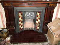 Fireplace with Edwardian tiling in Hurstmonceaux