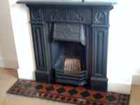 combination fireplace with Victorian tiling