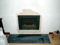 Invicta L700 inset wood burner freshly plastered in Varndean Brighton