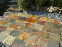 tiled patio in slate with slate edging