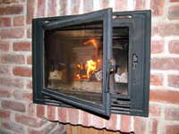 Invicta inset wood burner in rebuilt chimney breast